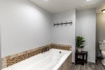 Deep soaker tub is an option in the master bathroom